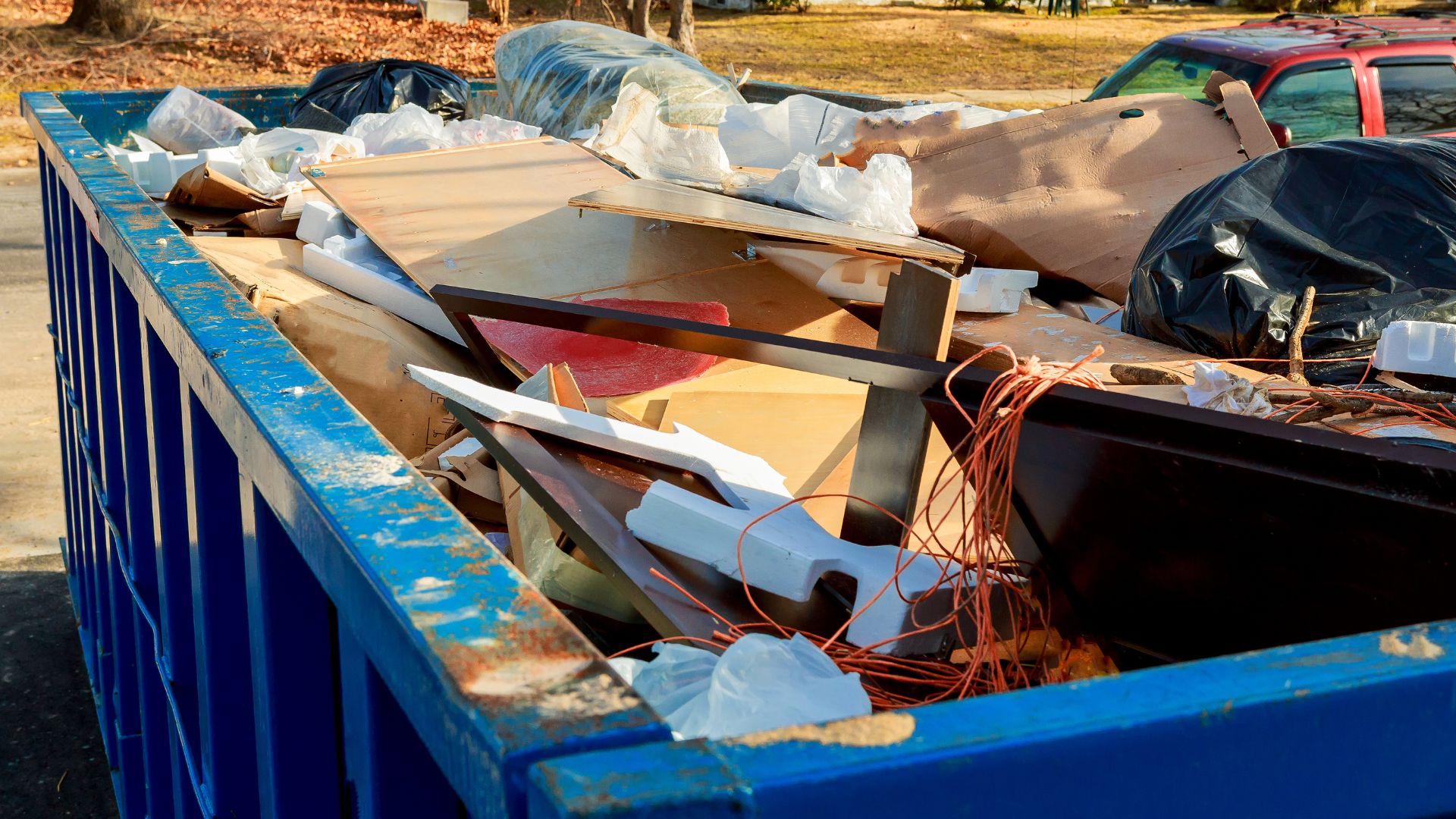 Over Flowing Dumpsters Being Full with Garbage